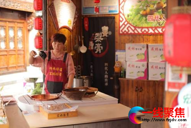 义乌非遗 贾江英一家四代做梨膏糖