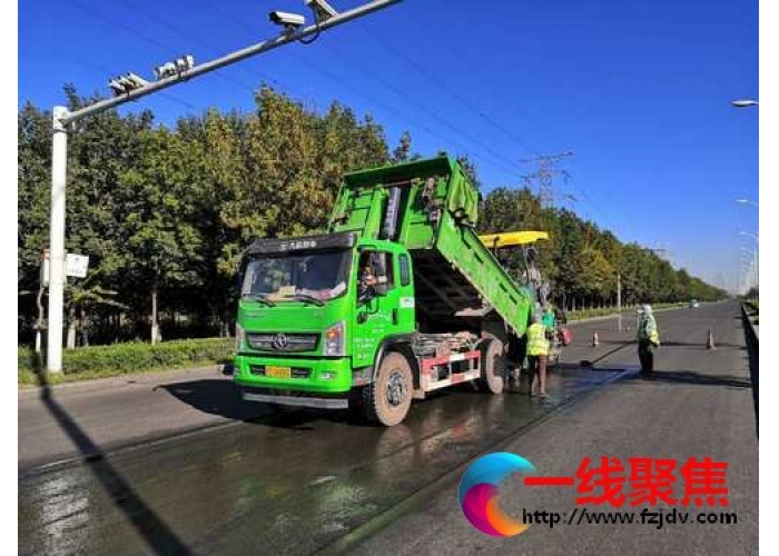 铣刨摊铺路面  为创城助力