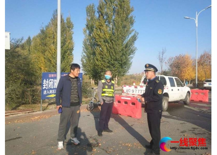 值守军垦一桥  确保桥面维护质量