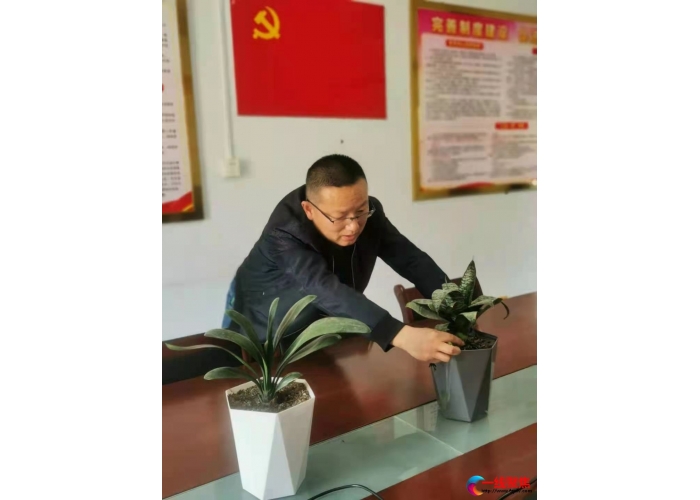 履行党员承诺  美化工作环境