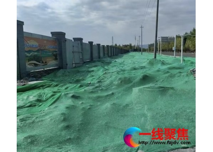 新疆石河子：覆盖绿网 让工地告别“尘土飞扬”